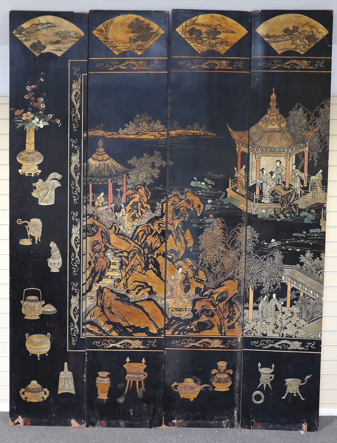 A tall Chinese coromandel lacquer twelve panel screen, 19th century, each leaf panel width 49cm, height 264cm